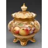 A Royal Worcester pot pourri vase and cover, c1970, painted with fruit, signed, 11cm h, black