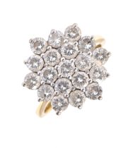 A diamond ring, the round brilliant cut diamond of hexagonal cluster design, in 18ct gold, 6.6g size