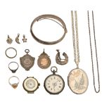 Miscellaneous silver jewellery, Victorian and later, to include a bangle, locket, watch fob shields,