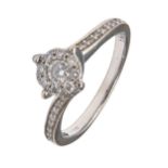 A diamond ring, with diamond shoulders, in 18ct white gold, 3.6g, size J Light wear