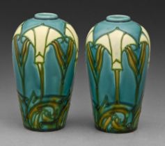 A pair of Minton Secessionist vases, c1905, 13cm h, printed mark One with flat chip near foot, the