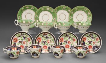 A set of four Samuel Alcock teacups and saucers, c1830, with green and gilt border, saucer 16cm