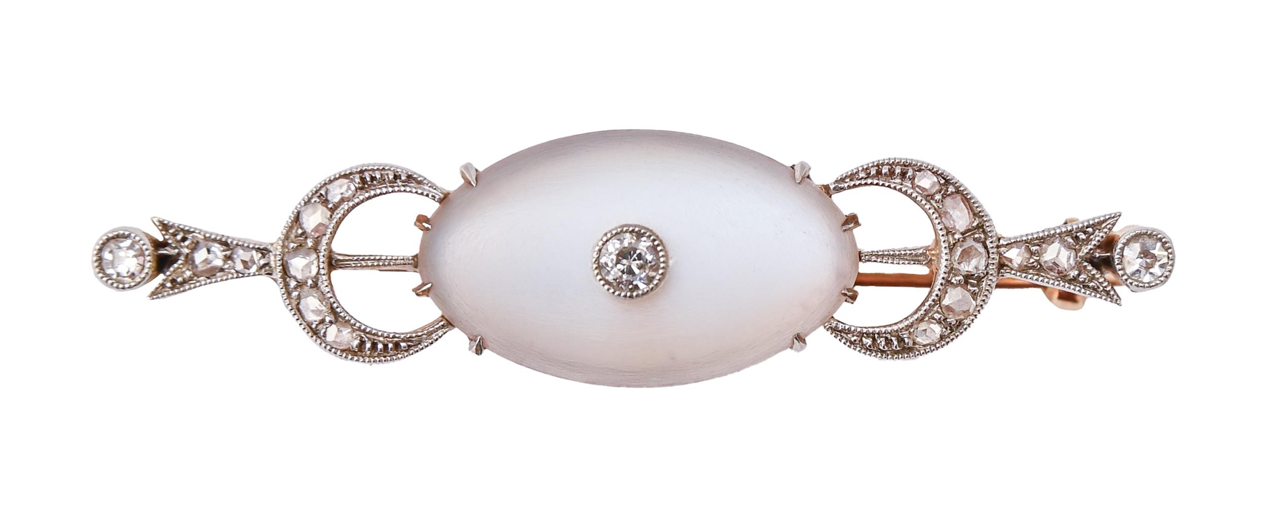 A moonstone and diamond bar brooch, early 20th c, in gold, 43mm l, 4.1g Fine quality and good