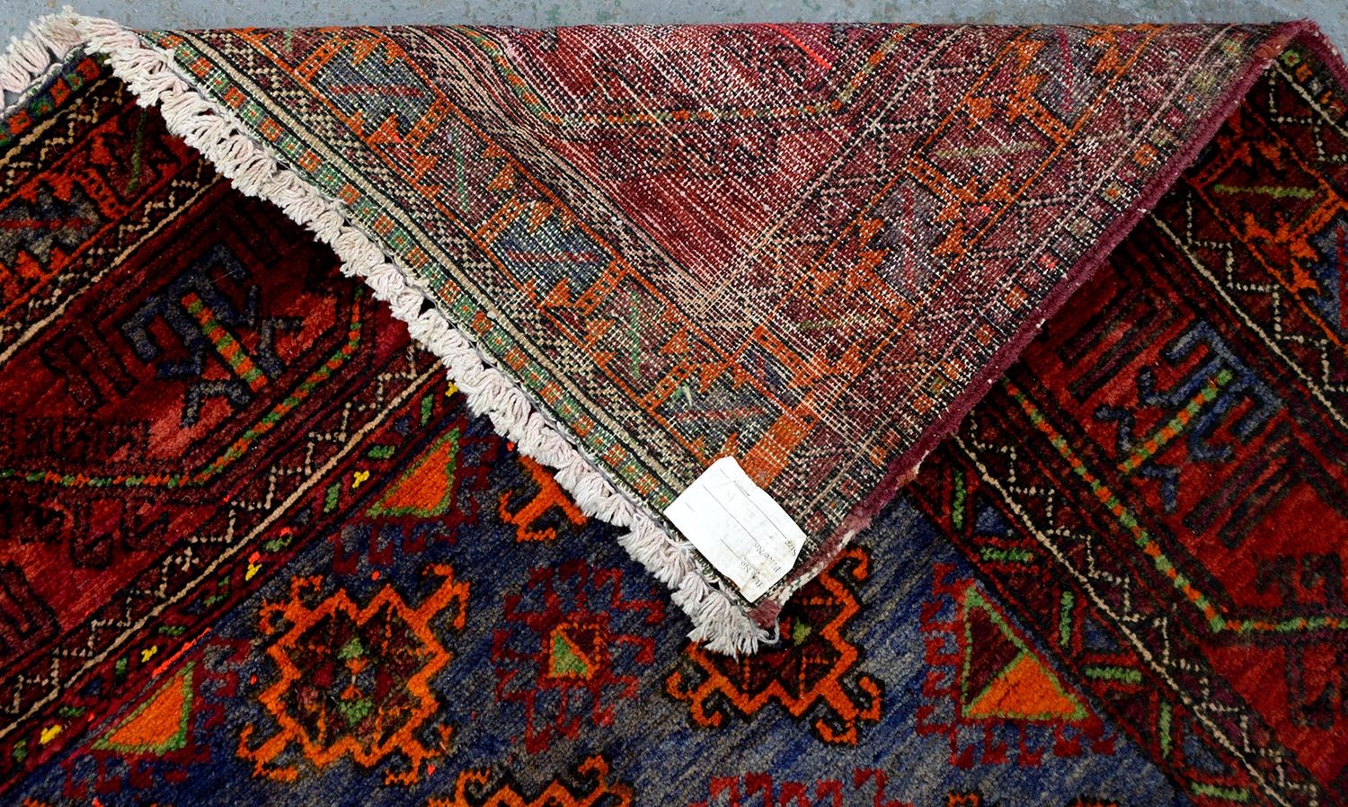 A Persian rug, 228 x 136cm and two runners, 294 x 102cm and smaller - Image 7 of 23