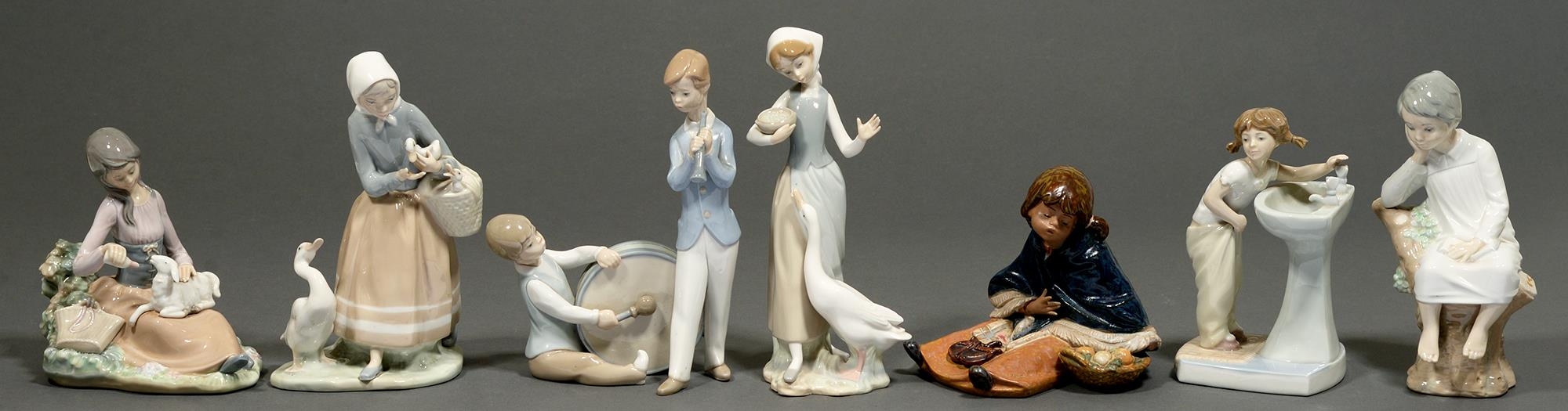 Seven Lladro figures, largest 24cm h