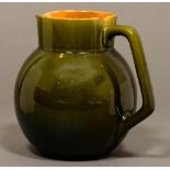 A Linthorpe art pottery jug, 19cm h Restored