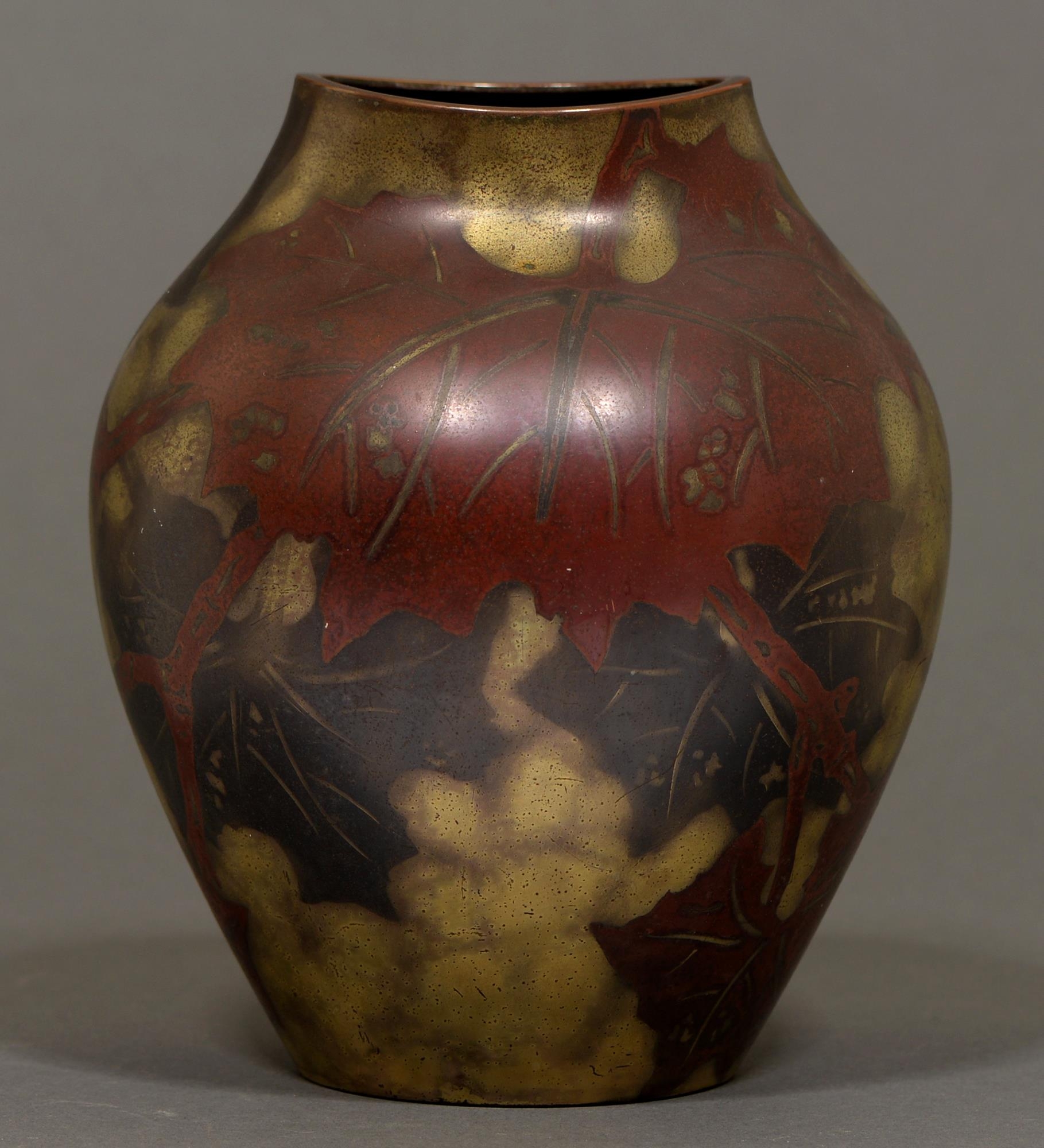 A WMF Ikora vase with leaf decoration, 24cm h