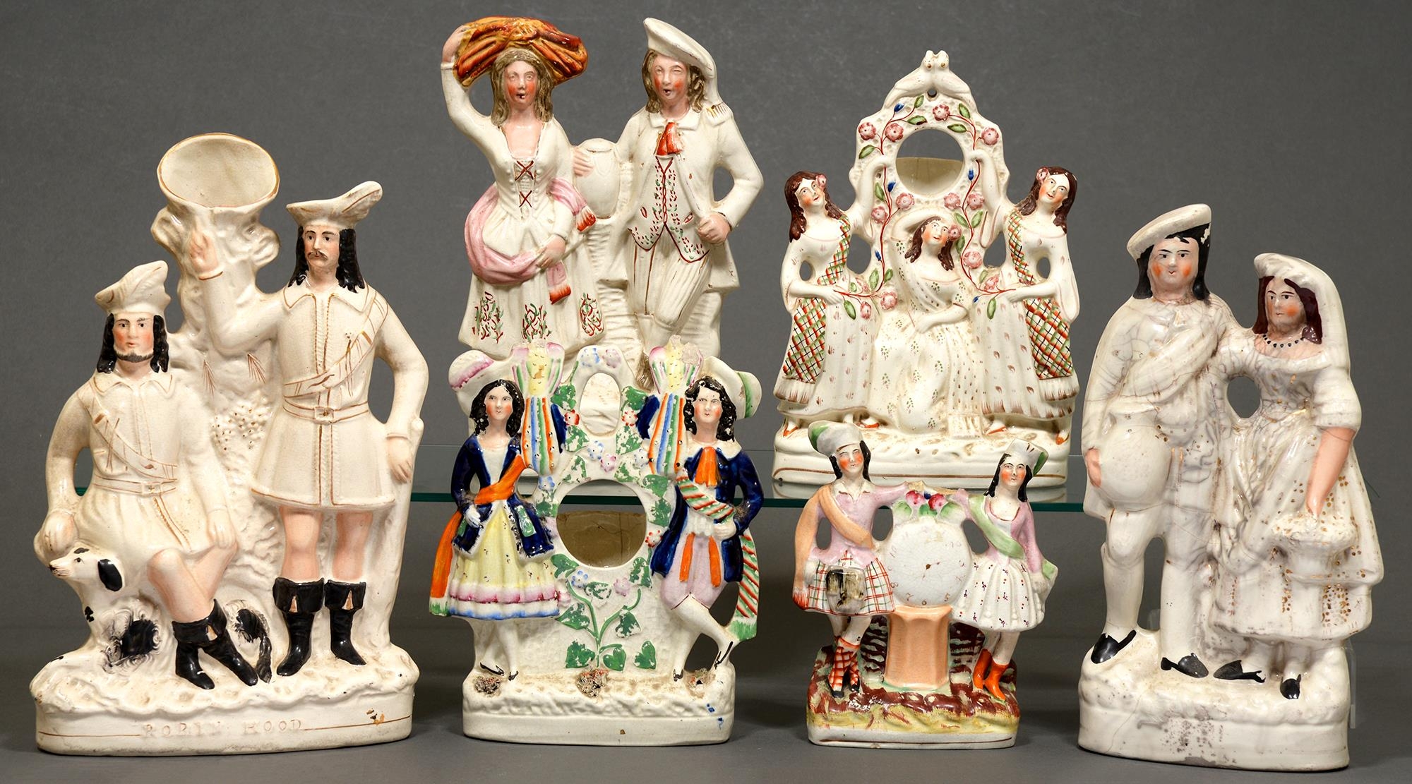 Six Staffordshire flatback figures, 19th c, largest 41cm h Some damage