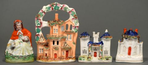 Three Victorian Staffordshire cottages,  largest 23cm h, and a  figure of Red Riding Hood (4) One