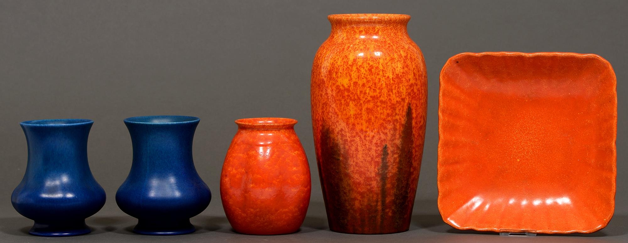 Four Pilkington's Royal Lancastrian vases and a dish