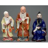 Three  Chinese porcelain figures of immortals,  36cm and smaller