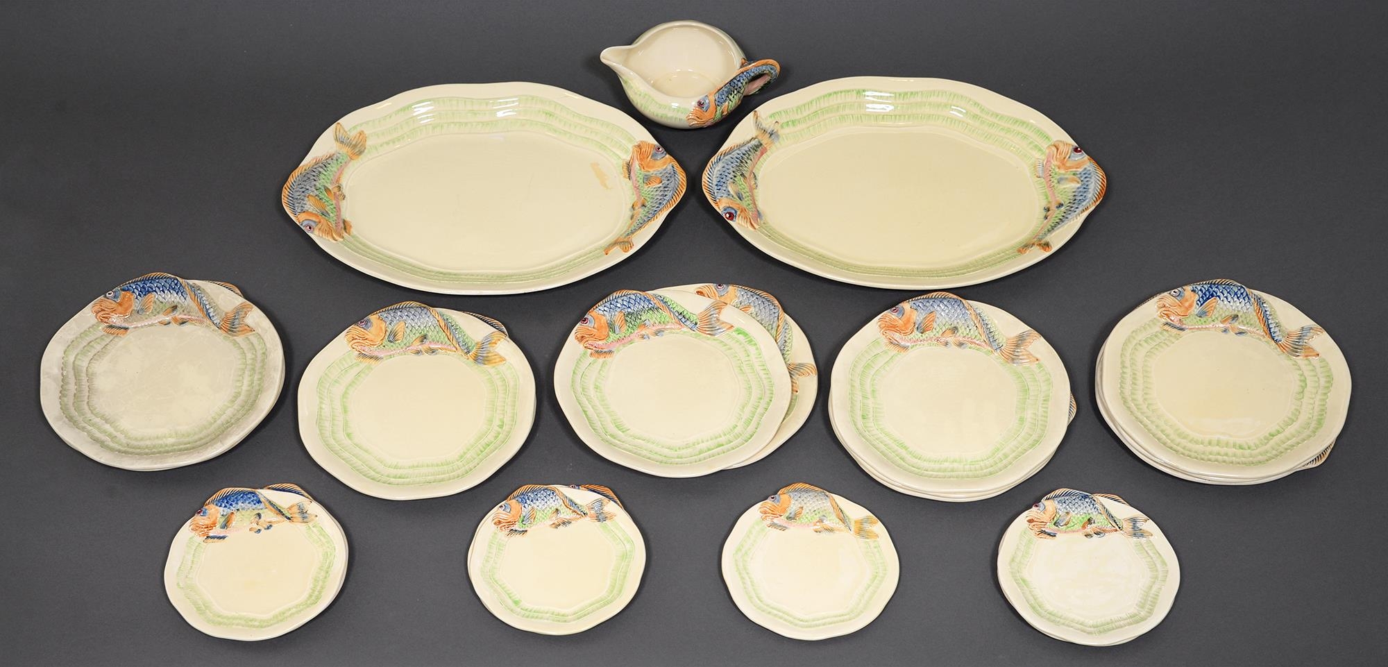 A Wilkinson & Co and Newport Pottery Clarice Cliff fish service,  platters 15cm (22)