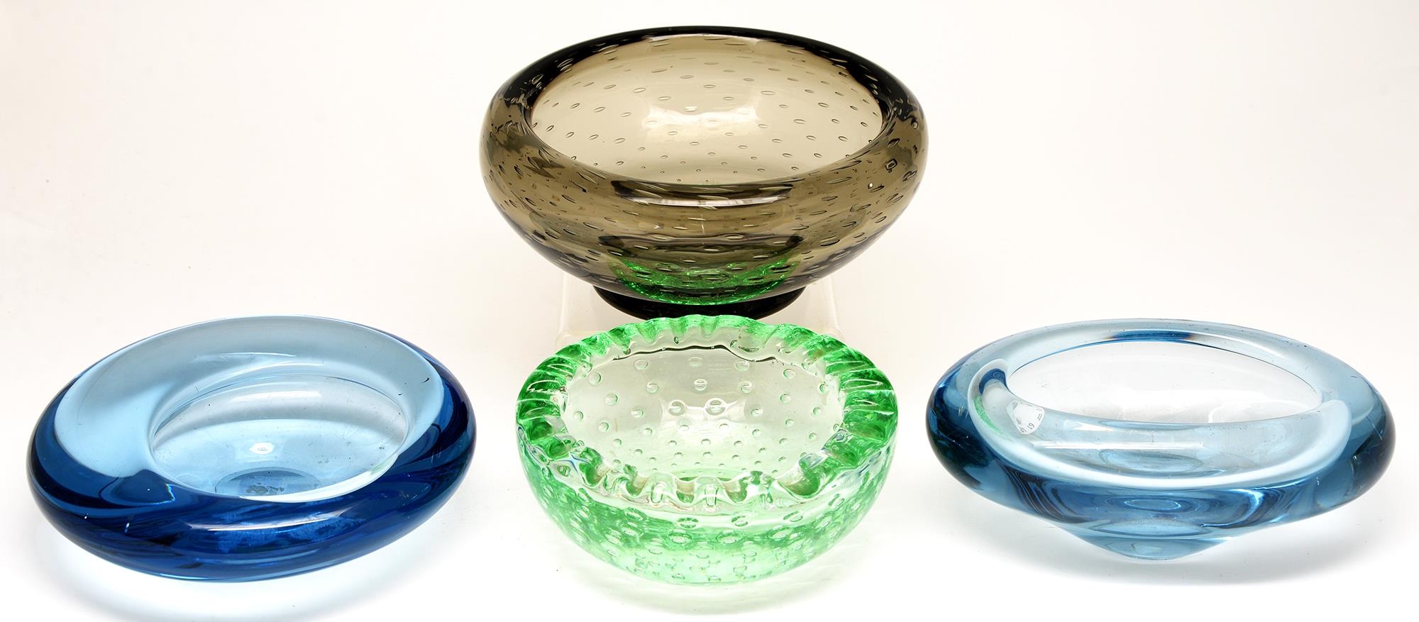 Four 1960's coloured glass bowls, largest 22cm diam