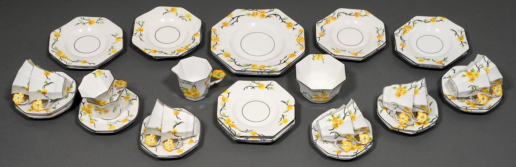 A 1930s Melba bone china tea service, decorated with yellow flowers (40)