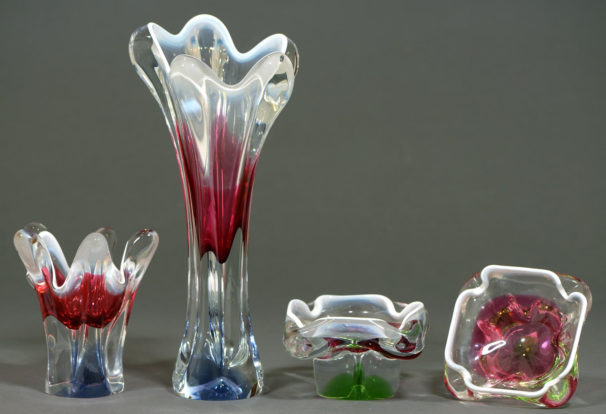 Four Studio glass vases and dishes