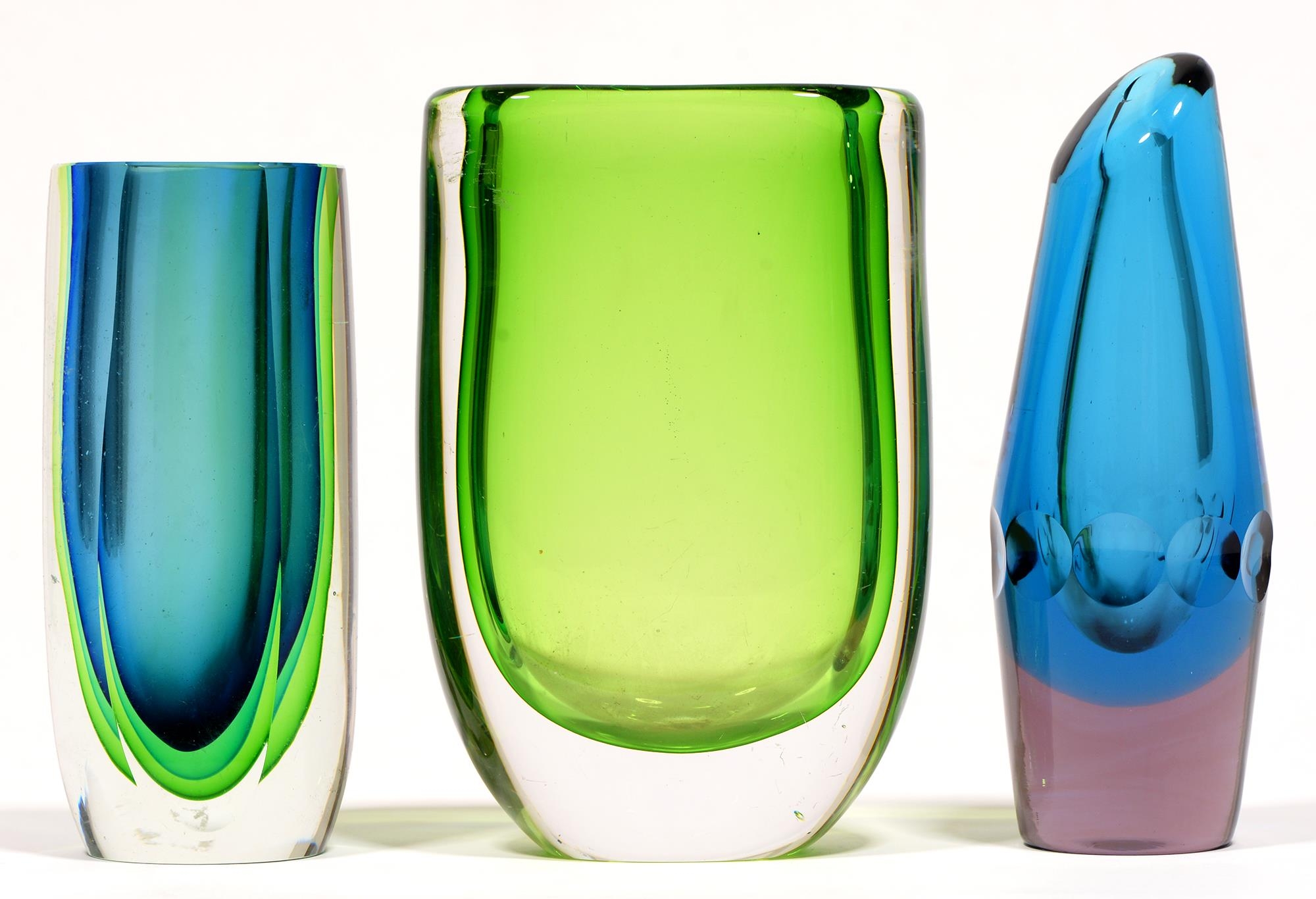A Kosta green glass vase,  22cm h and two other vases (3)