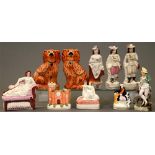 Ten Staffordshire figures, including flatbacks and pair of dogs, 26cm and smaller