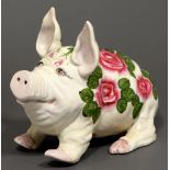 A reproduction Wemyss ware seated pig,  26cm h; 36cm l