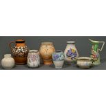 Eight earthenware vases and jugs, to include Poole, Langley, Denby and Charlotte Rhead (8)