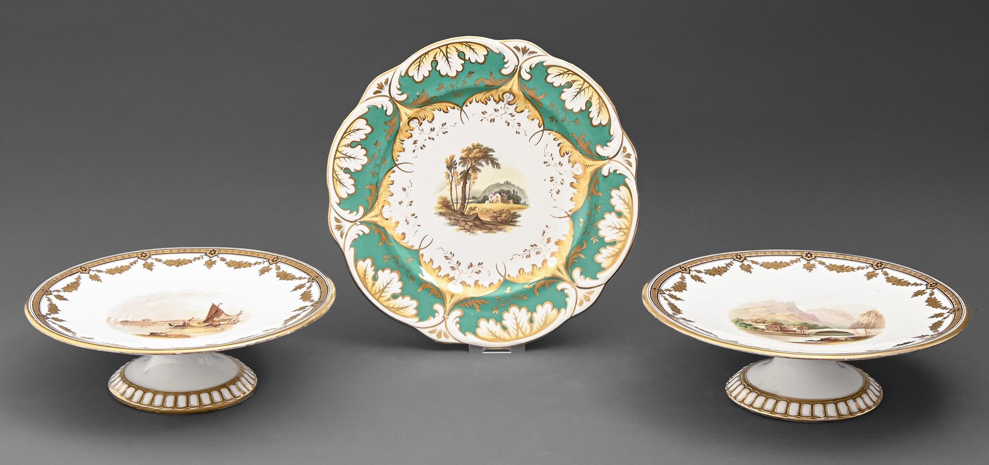 A pair of Minton fruit stands, with painted landscapes and Rockingham plate, 23cm diam (3) Plate