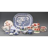 Three Staffordshire cow and calf groups, two cow creamers and blue and white ceramics, including
