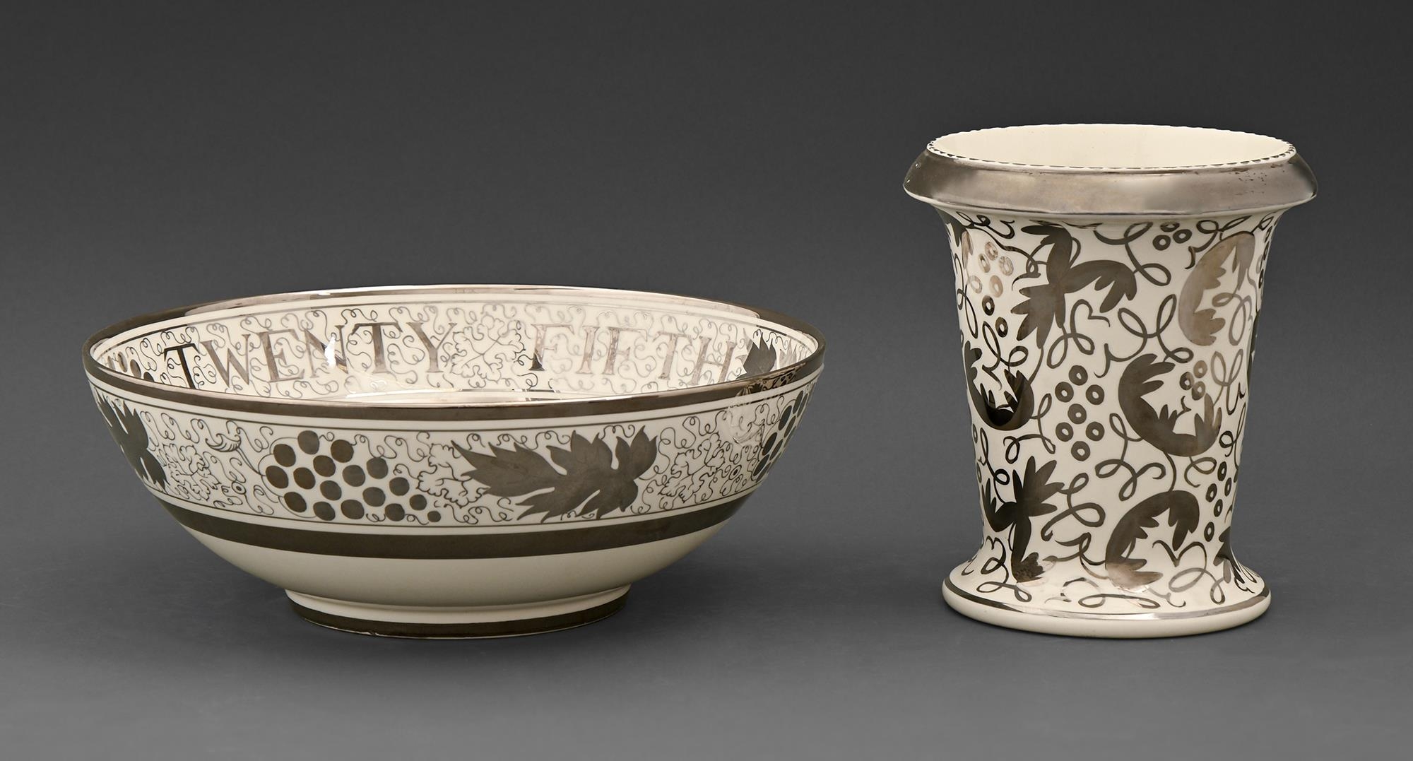 A Gray's Pottery silver lustre bowl, 26cm diam and a Wedgwood silver lustre vase, 16.5cm h (2)