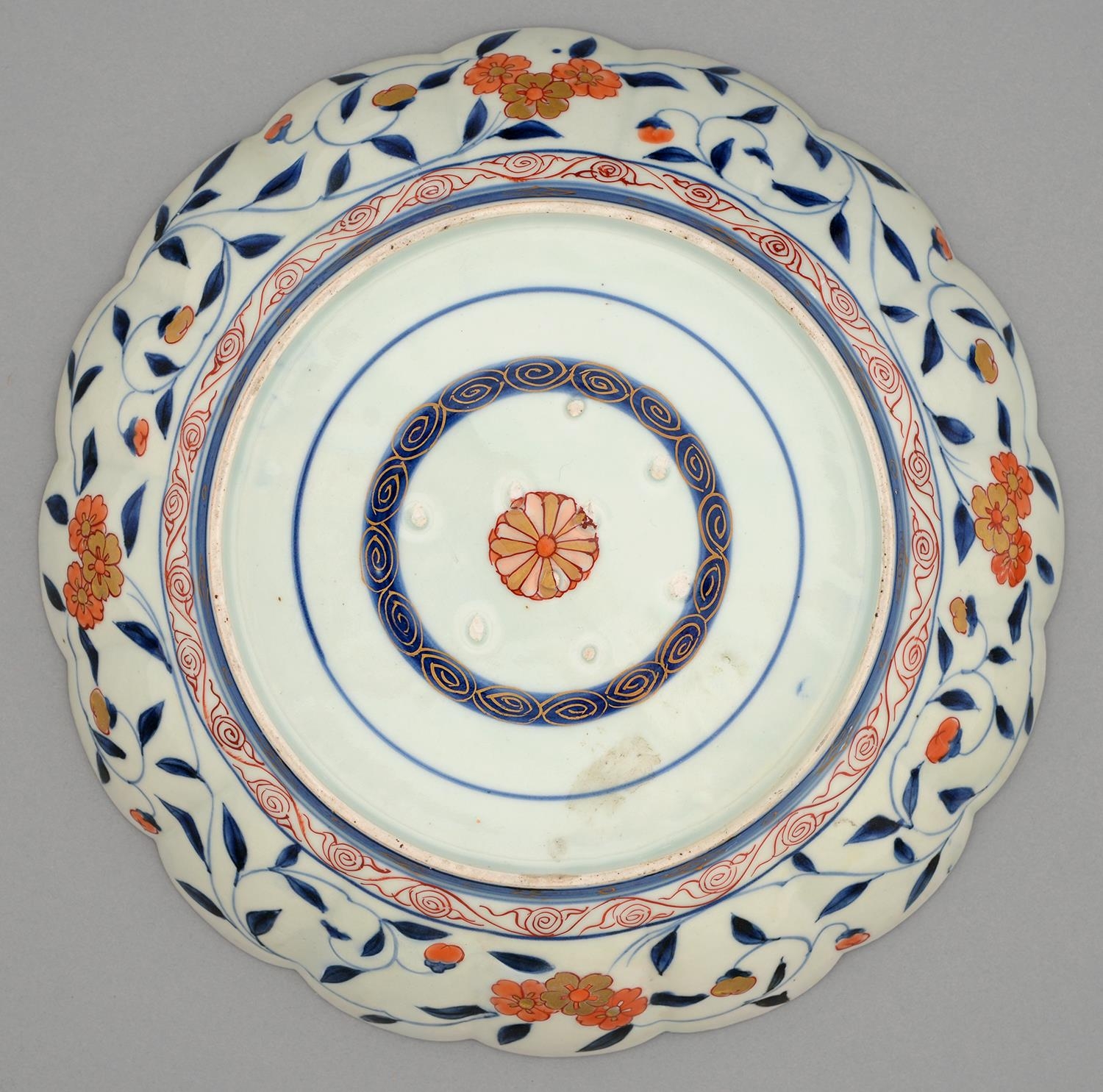 An Imari fluted dish, Edo period, 18th c, painted in underglaze blue and enamelled in red and gilt - Image 2 of 2