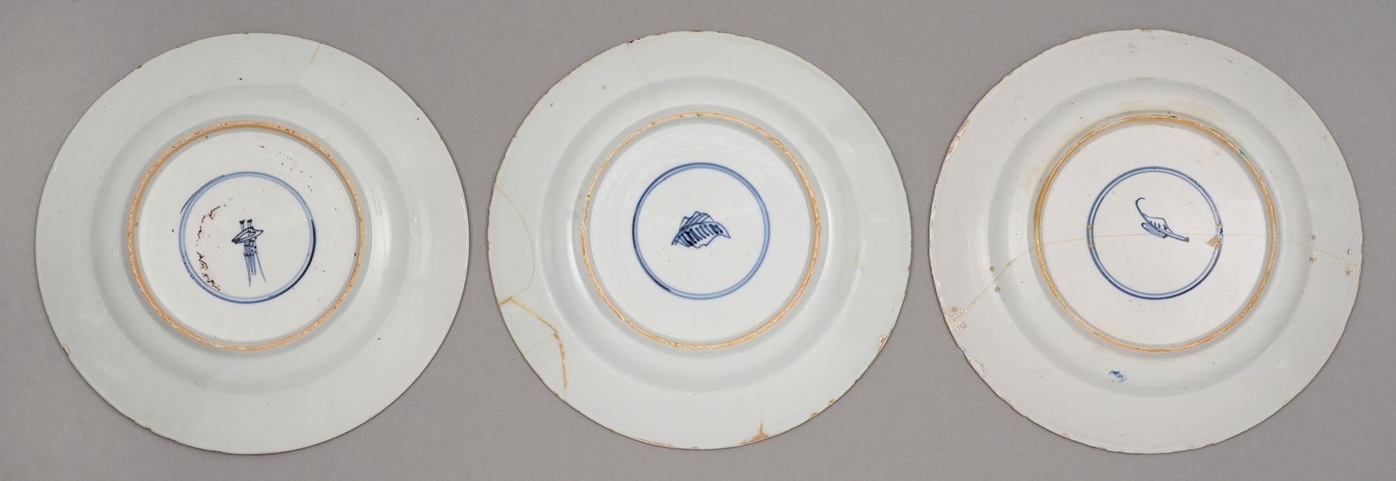 Three Chinese famille verte plates, Kangxi period, enamelled with two dogs of Fo beneath a flowering - Image 2 of 2