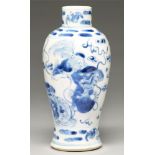 A Chinese blue and white baluster vase, 19th / early 20th c, painted with dogs of Fo, 19cm h, Kangxi