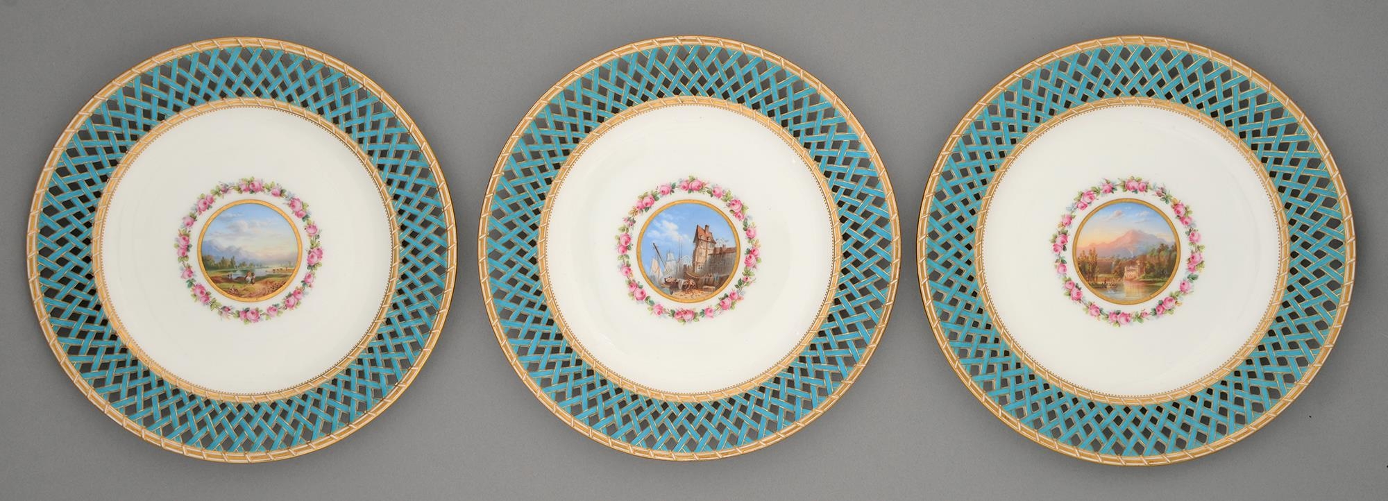 A set of three Minton plates, c1870, painted to the centre with a Continental landscape encircled by