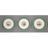 A set of three Minton plates, c1870, painted to the centre with a Continental landscape encircled by