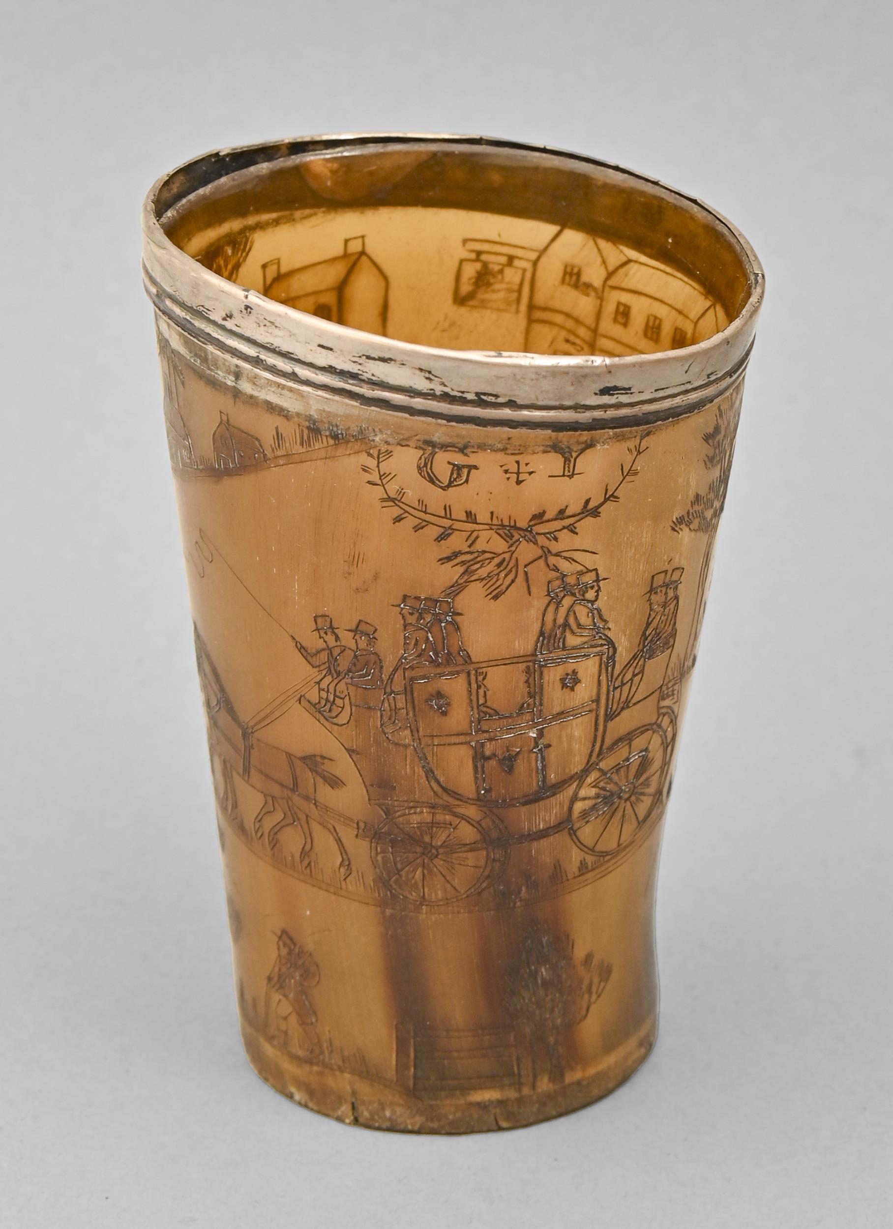 Folk art. An English silver mounted horn beaker, pyrographically decorated with a continuous