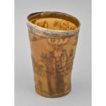 Folk art. An English silver mounted horn beaker, pyrographically decorated with a continuous