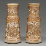 A pair of Satsuma ware vases, Meiji period, enamelled and gilt with Kannon and a group of five