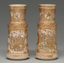 A pair of Satsuma ware vases, Meiji period, enamelled and gilt with Kannon and a group of five