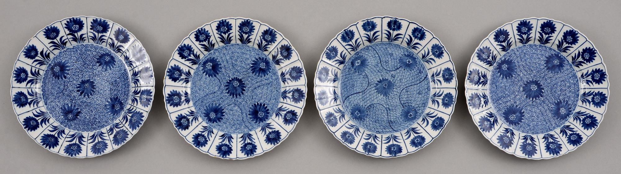 Four Chinese blue and white plates, 18th c, painted with the aster pattern, 23cm diam One plate with