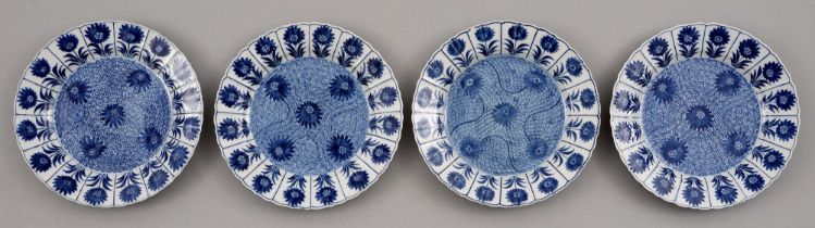 Four Chinese blue and white plates, 18th c, painted with the aster pattern, 23cm diam One plate with