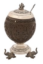 An Indian silver mounted coconut bowl and cover, Maharashtra, late 19th c, finely carved with five
