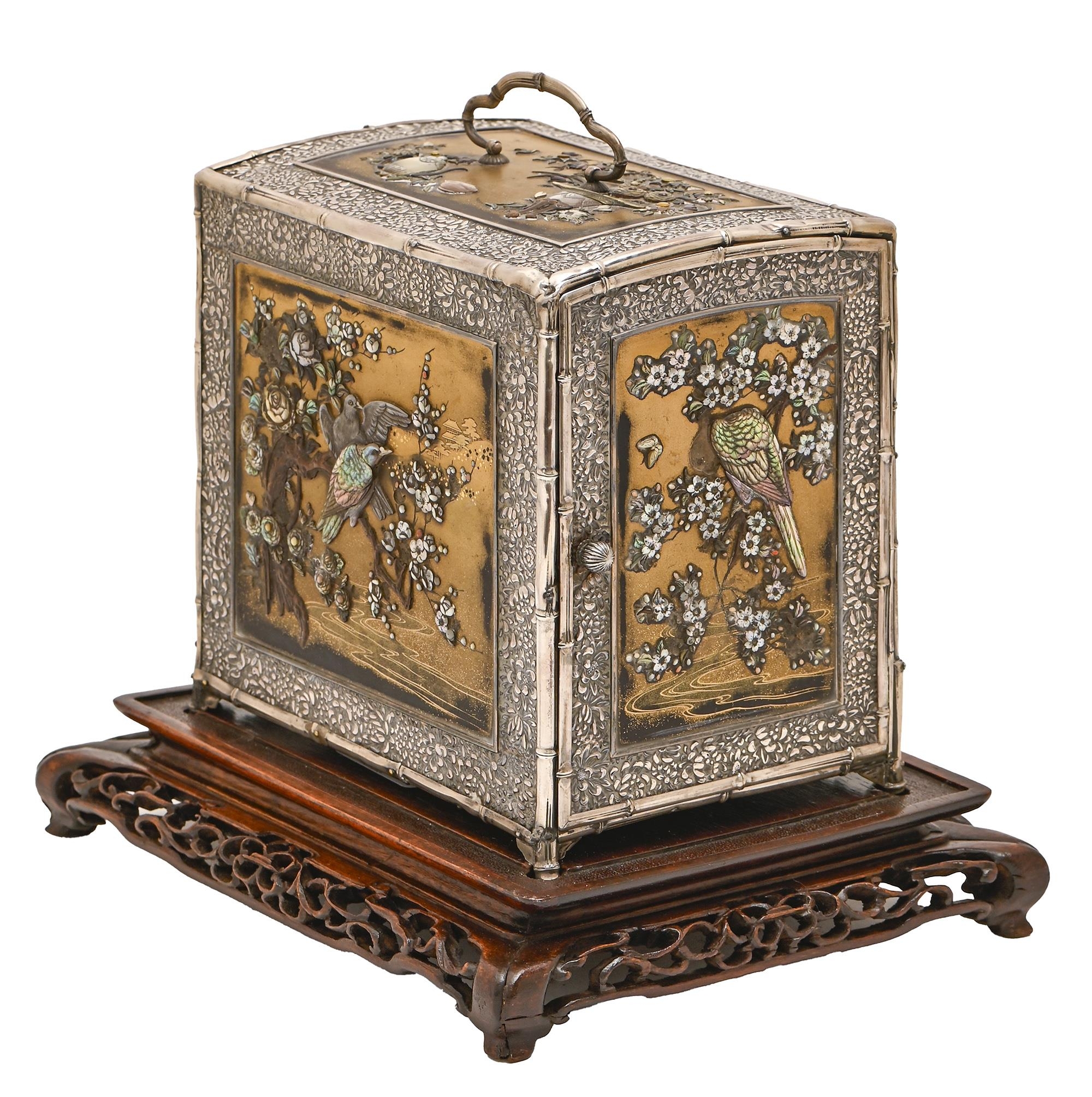 A Japanese silver mounted dhibayama cabinet, kodansu, Meiji period, slightly domed top decorated