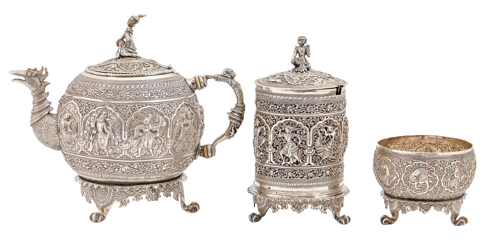 An extraordinary and heavy Burmese globular silver teapot, sugar bowl and betel box and cover,