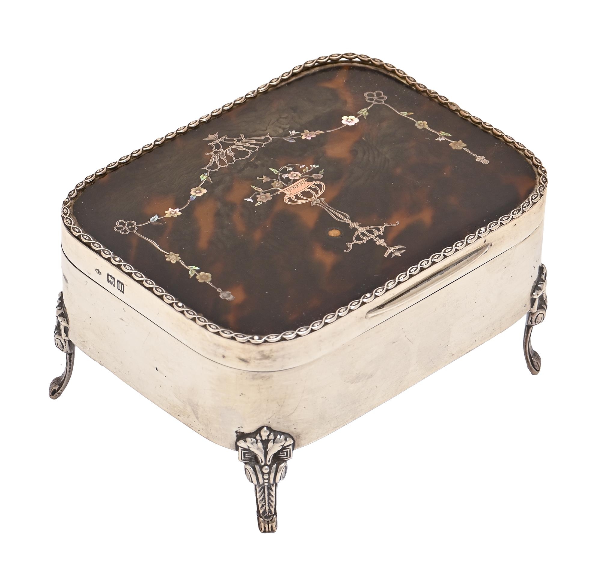 An Edward VII gold, silver and mother of pearl inlaid tortoiseshell inset silver jewel box, on