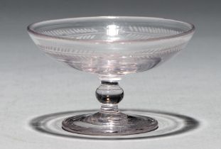 An English glass patch stand, c1780, the engraved saucer bowl on knopped stem, 10cm diam Undamaged