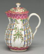 A Worcester hot milk jug and cover, c1775, enamelled in Sevres style with the Hop Trellis pattern,