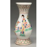 A Chinese wucai wall vase, Kangxi period, painted with a lady and fence between red and gilt