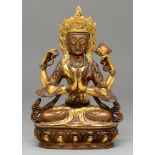 A Sino Tibetan jewelled and gilt bronze figure of a Bodhisattva, 20th c, set with turquoise and