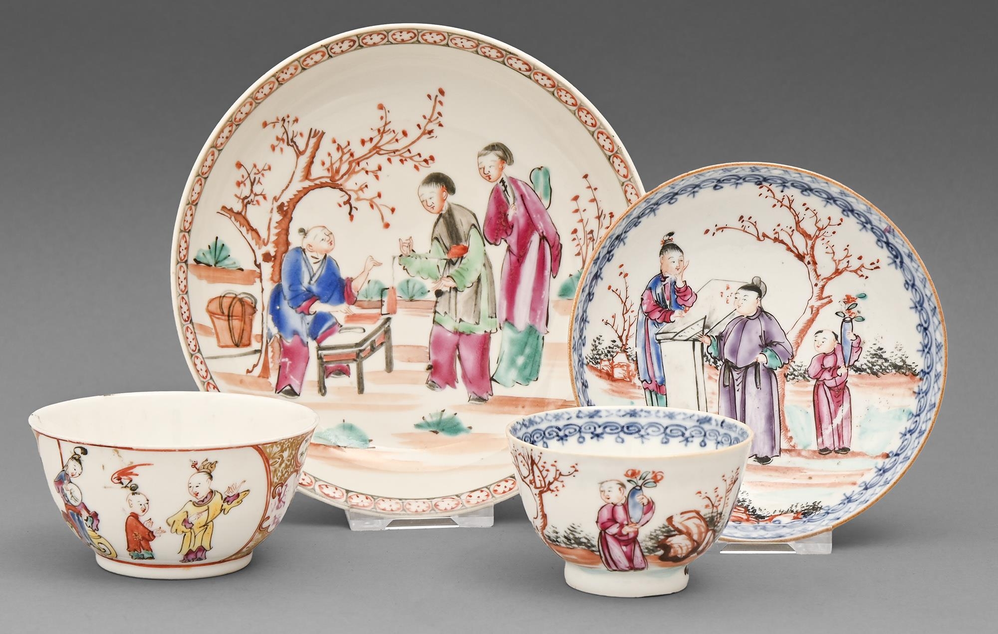 A Chinese export porcelain tea bowl and saucer, and a contemporary tea bowl and a saucer, all c1770,