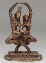 An Indian bronze sculpture of Shiva and Parvati, 17.5cm h Complete and undamaged