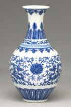 A Chinese blue and white vase, 19th c, the ovoid body tapered towards the foot, painted to