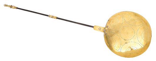 A brass warming pan, English or Dutch, early 18th c, the lid with simple pierced lunette design,