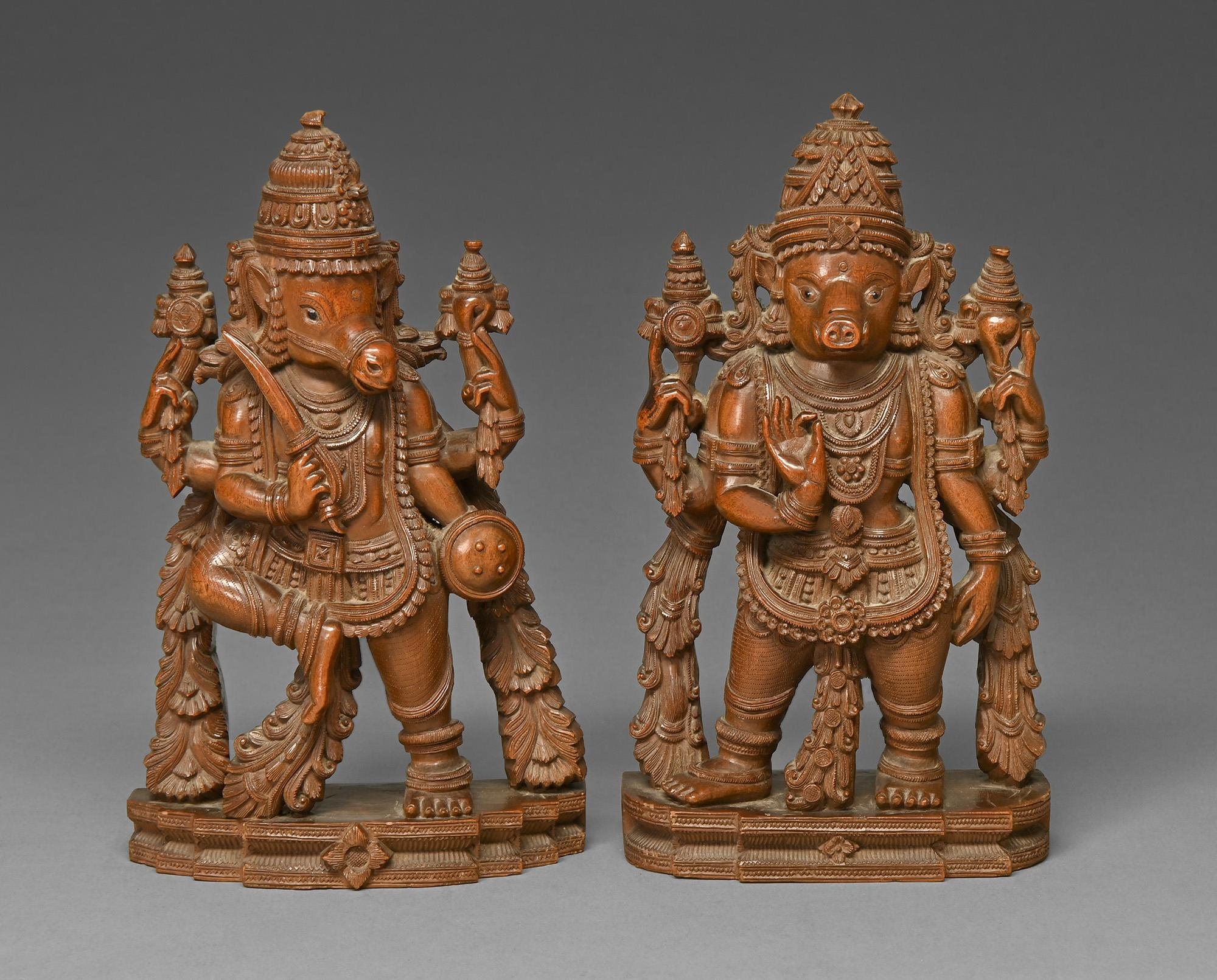 A pair of Indian sandalwood carvings of Vishnu manifested as the avatars Varaha and Kalki, 19th c,